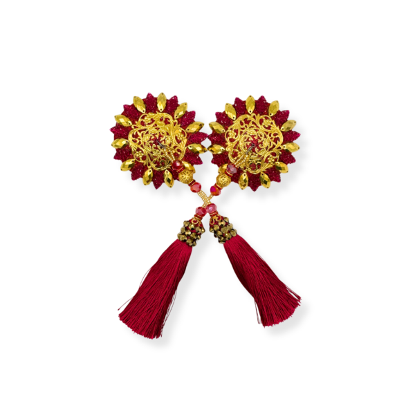 Ekstrawaganckie pasties w kolorze złota i czerwieni