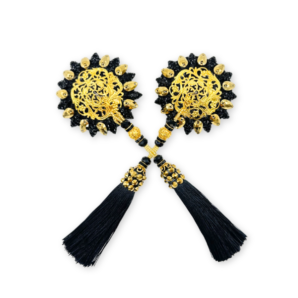 Bogato zdobione pasties w czarno-złotym wydaniu